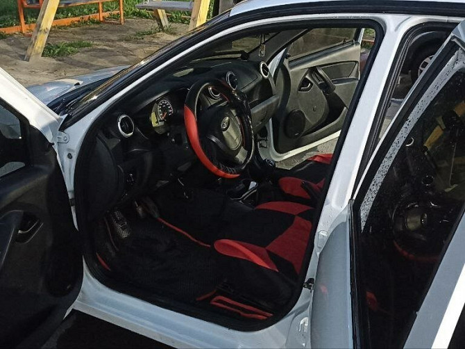 Автомобиль Lada Granta, 2013 г. Нефтеюганск - изображение 11