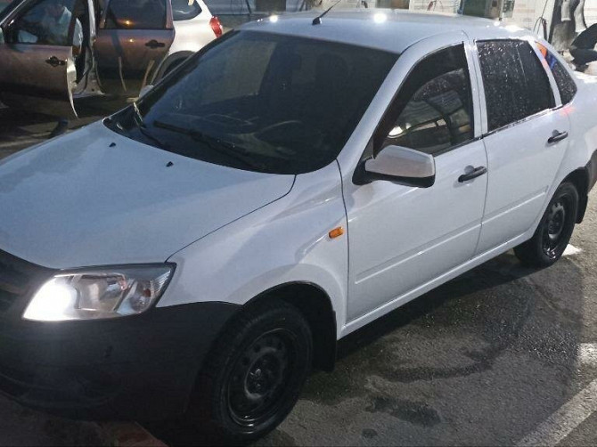 Автомобиль Lada Granta, 2013 г. Нефтеюганск - изображение 1